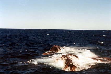 Wave crashing on rocks 2